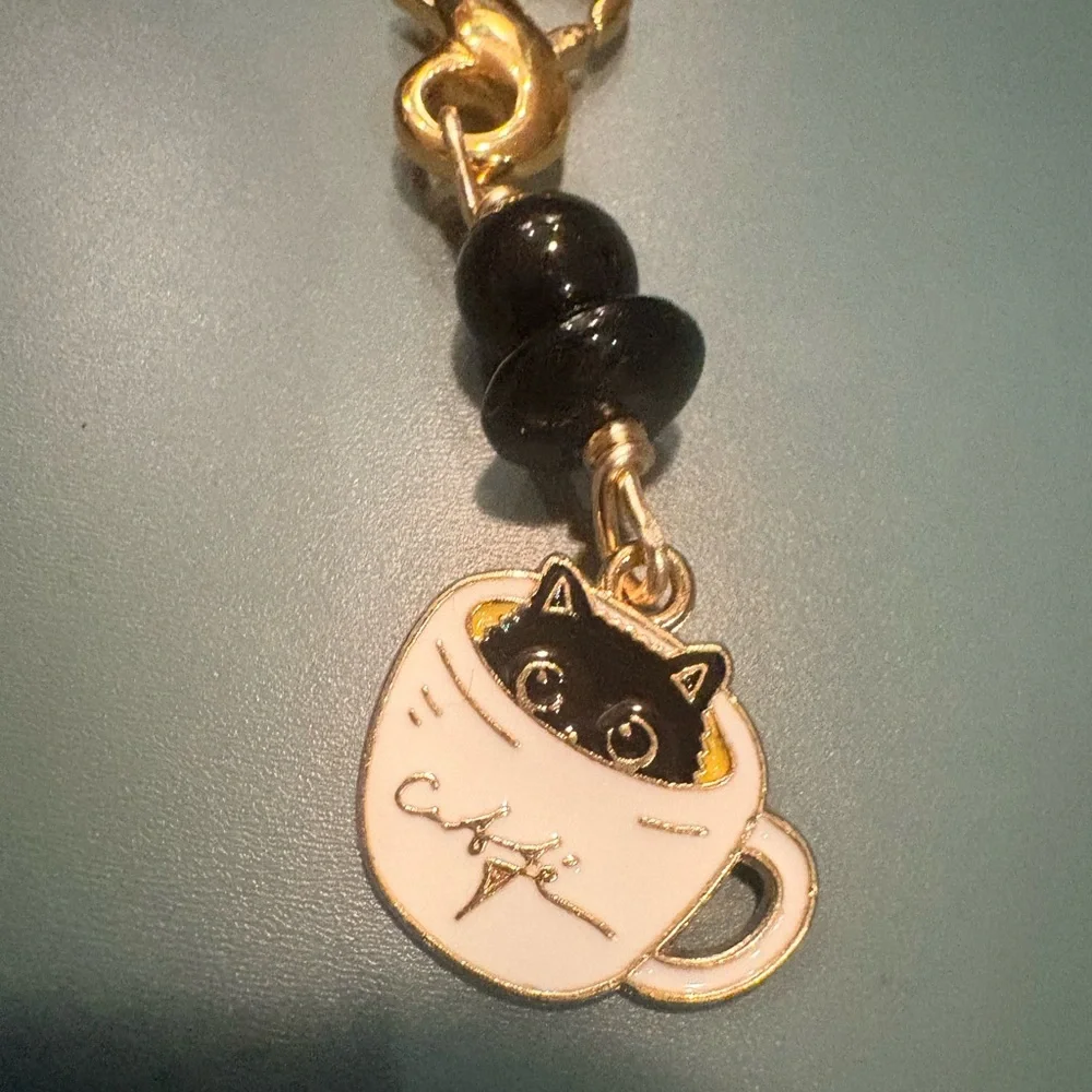Boutique: Charming Cat Coffee Cup Keychain zipper pull- Black and Gold